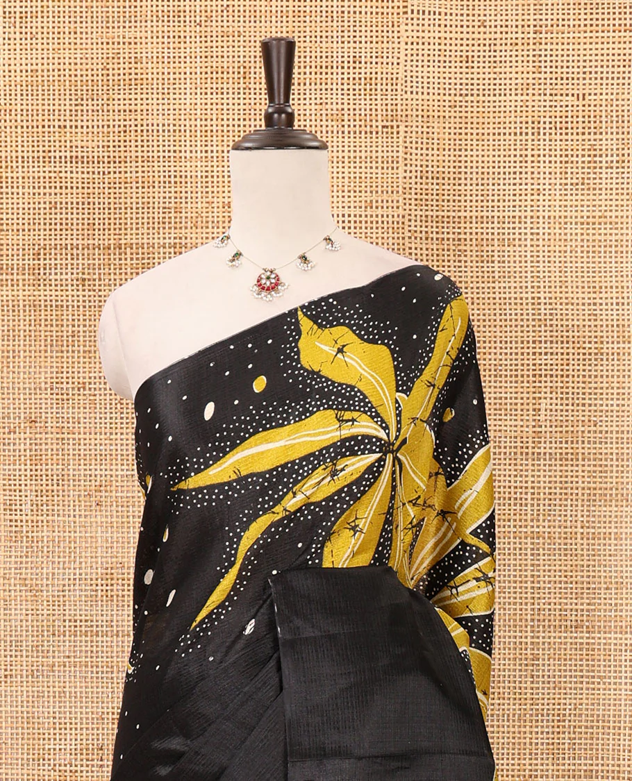 Black-base plain body khadi cotton saree with batik-style yellow-color radiant sunburst design on its border & pallu, plain black blouse - Image 3