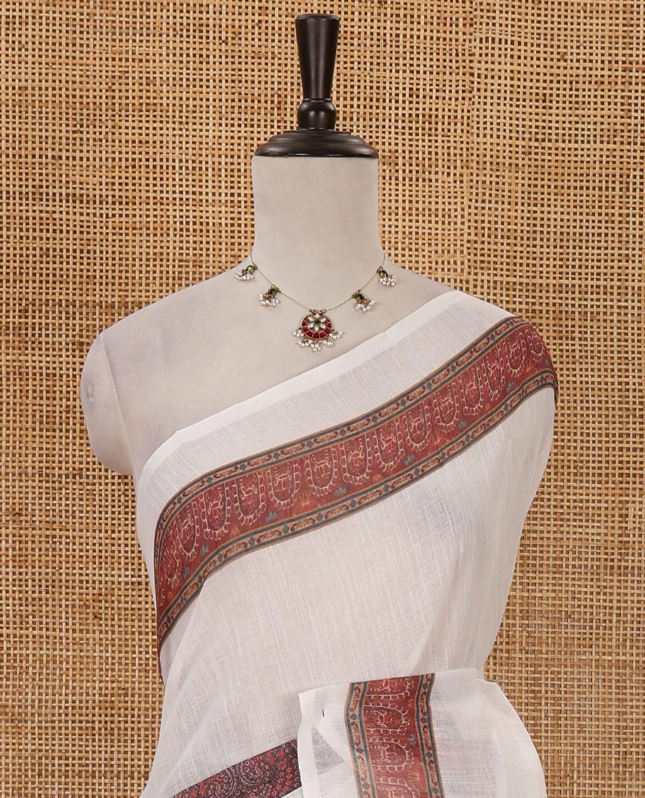White half-plain & half-printed linen cotton saree, brown-color printed border, paisley motifs printed pallu & uniquely printed blouse - Image 3